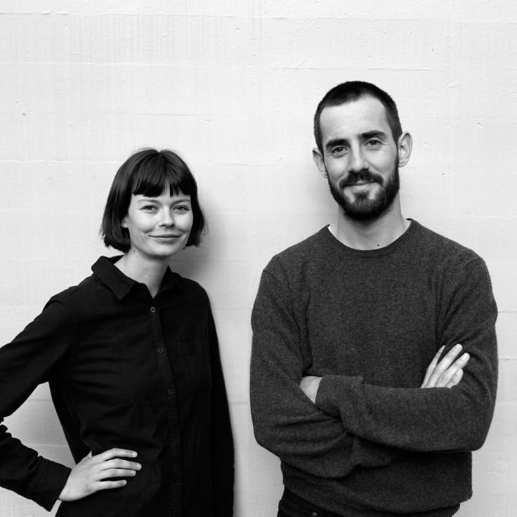 Two colleagues smiling